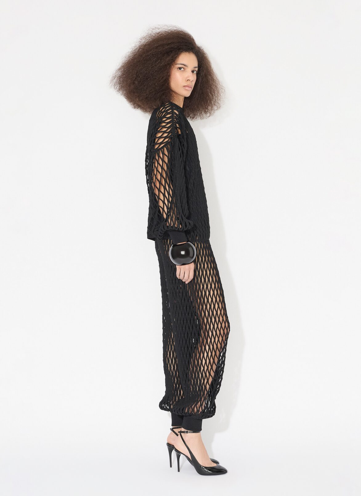 MACRAMÉ KNIT PANTS ALAÏA BLACK MACRAMÉ KNIT PANTS